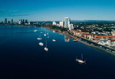 High angle view of sea and buildings in city