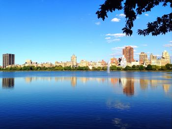 Reflection of buildings in lake