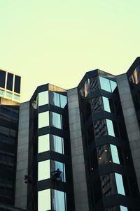 Low angle view of buildings against clear sky