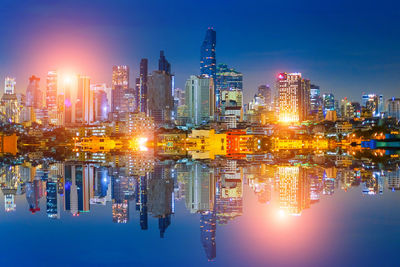 Illuminated buildings in city at night