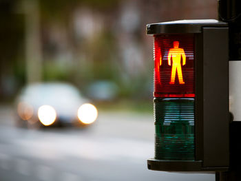 Close-up of illuminated road signal