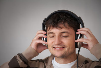 Portrait of young man using mobile phone