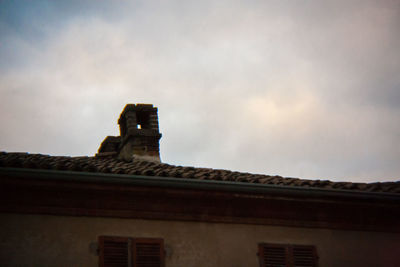 Low angle view of roof against sky