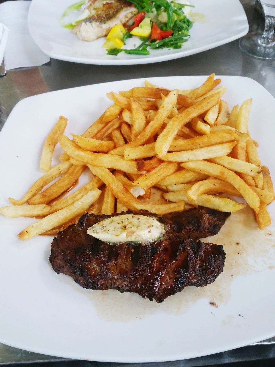 food, food and drink, ready-to-eat, freshness, plate, indoors, meal, serving size, meat, close-up, still life, french fries, high angle view, table, healthy eating, indulgence, fried, sauce, prepared potato, cooked