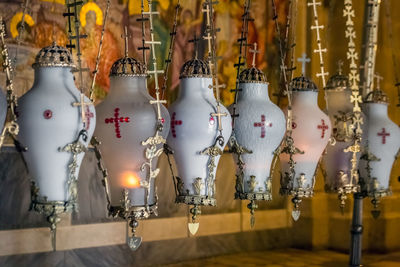 Close-up of clothes hanging in store for sale