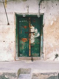 Closed window of abandoned building