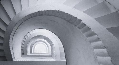 Directly above shot of spiral staircase in building