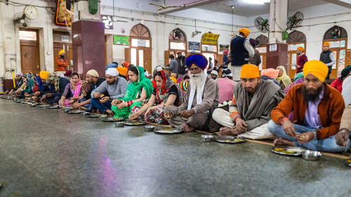 People sitting in corridor