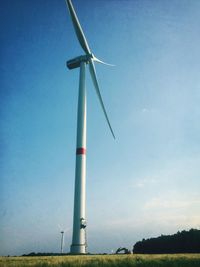 Wind turbines on field