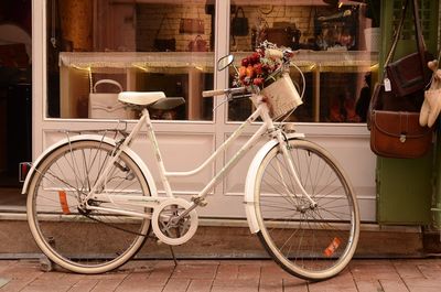 Bicycle parked in front of building