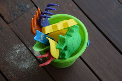 High angle view of toys in bucket