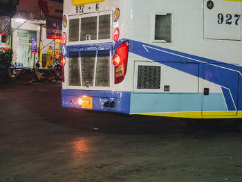 Cars on illuminated city at night