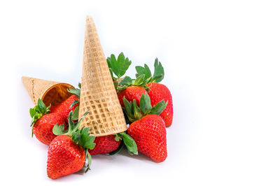 Close-up of chopped fruits against white background