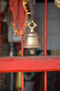 Close-up of bell tower against building