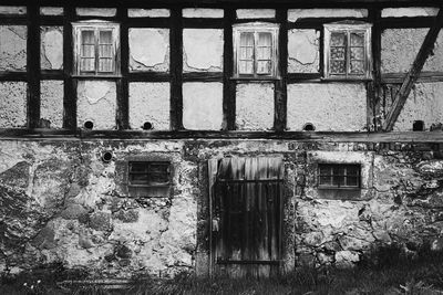 Abandoned building seen through window