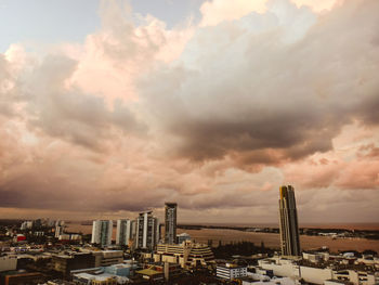 Cityscape against sky during sunset