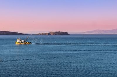 Scenic view of sea against sky during sunset