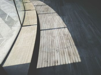 High angle view of shadow on wood