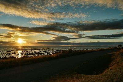 Scenic view of sea at sunset