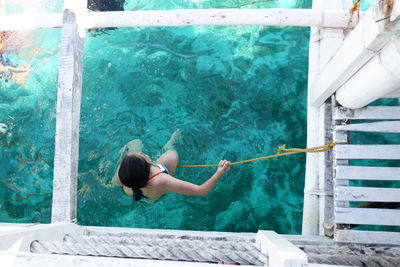 Woman swimming in pool