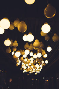 Low angle view of illuminated lamp post