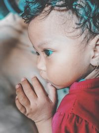 Portrait of cute boy looking away