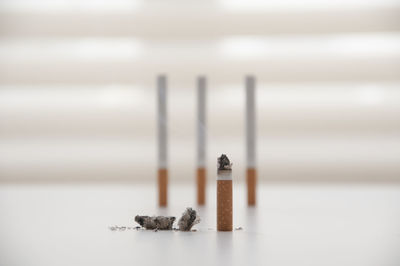 Close-up of cigarette on table