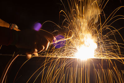 Firework display at night