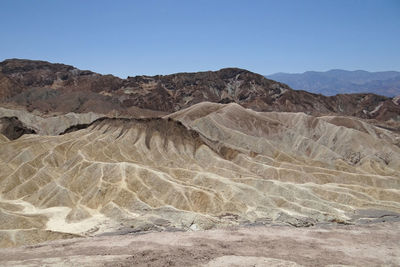 Scenic view of mountains against clear sky