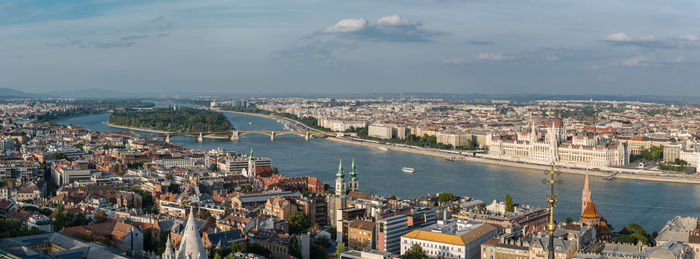 High angle view of river amidst buildings in city