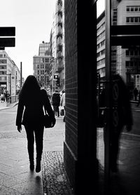 Woman standing in city