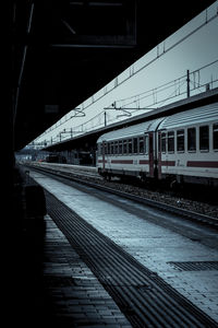Railroad station platform at night