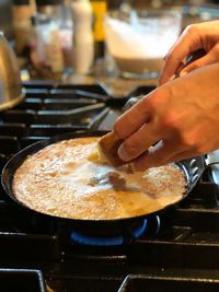 Close-up of person preparing food