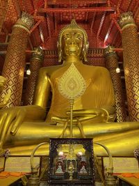 Statue of buddha in temple building