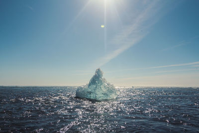 Large glacier in azure sea landscape photo