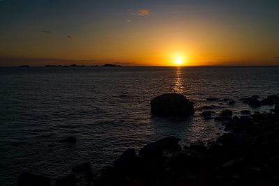 Scenic view of sunset over sea