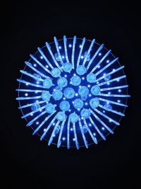 Low angle view of illuminated lights