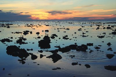 View of calm sea against scenic sky