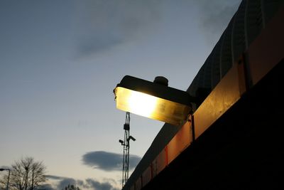 Low angle view of street light against sky