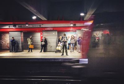 People waiting at subway station