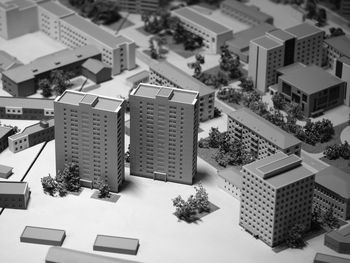 High angle view of buildings and trees in city