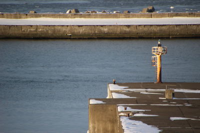 Pier over sea during winter