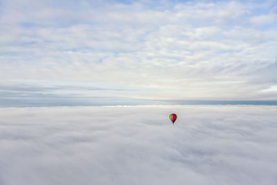 Low angle view of hot air balloon flying in sky