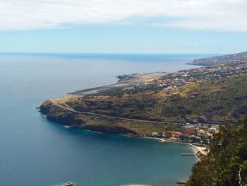 High angle view of bay against sky