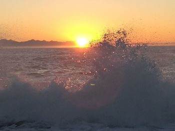 Scenic view of sea against sky during sunset