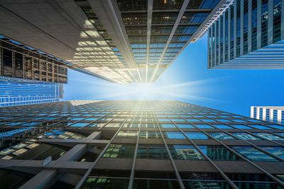 Sunbeam amidst modern office buildings