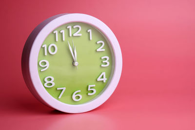 Close-up of clock on wall