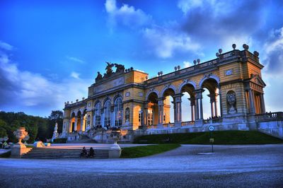 Exterior of schonbrunn palace against sky during sunset