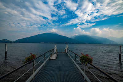 Pier over sea against sky