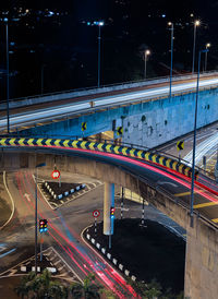 High angle view of light trails on elevated road